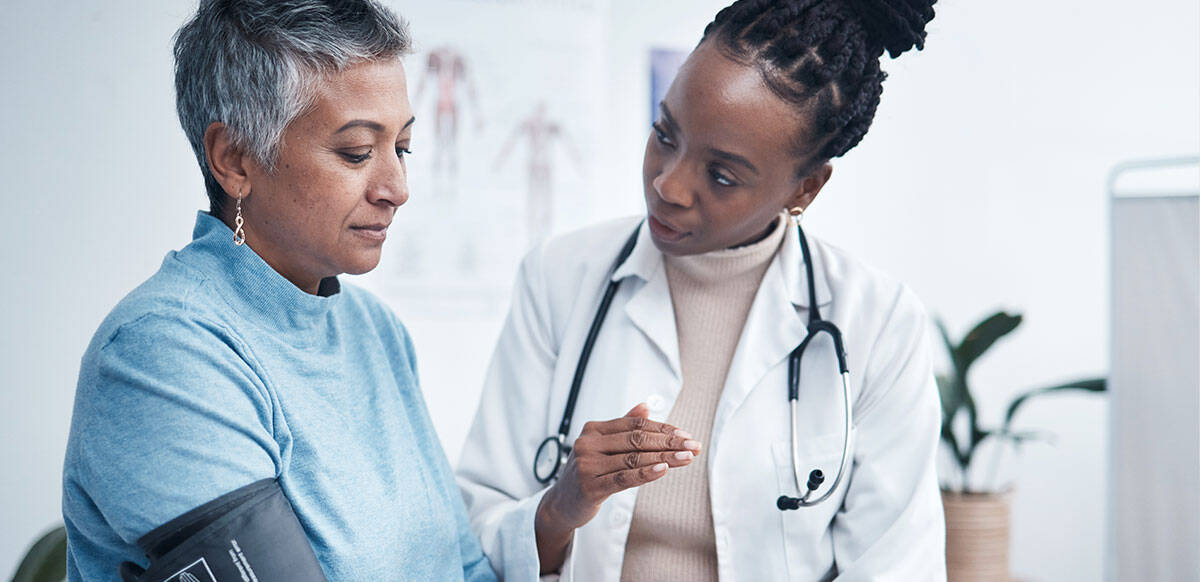 doctor and patient talking about blood pressure